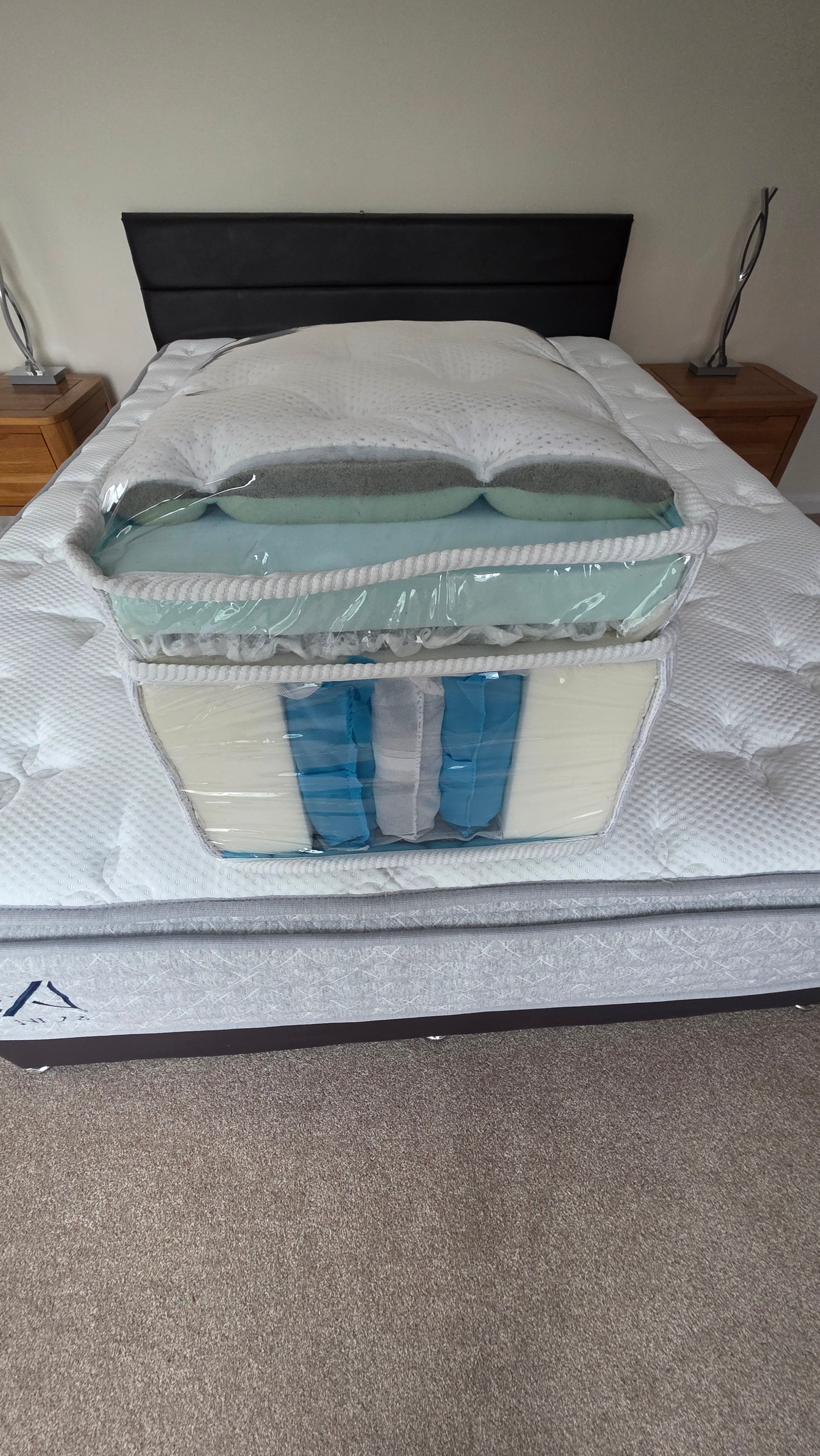 Healthy Sleep Mattress Neo Gravity Cloud 3000 pocket-sprung mattress with plush fabric and supportive coils, shown in a bedroom setting.